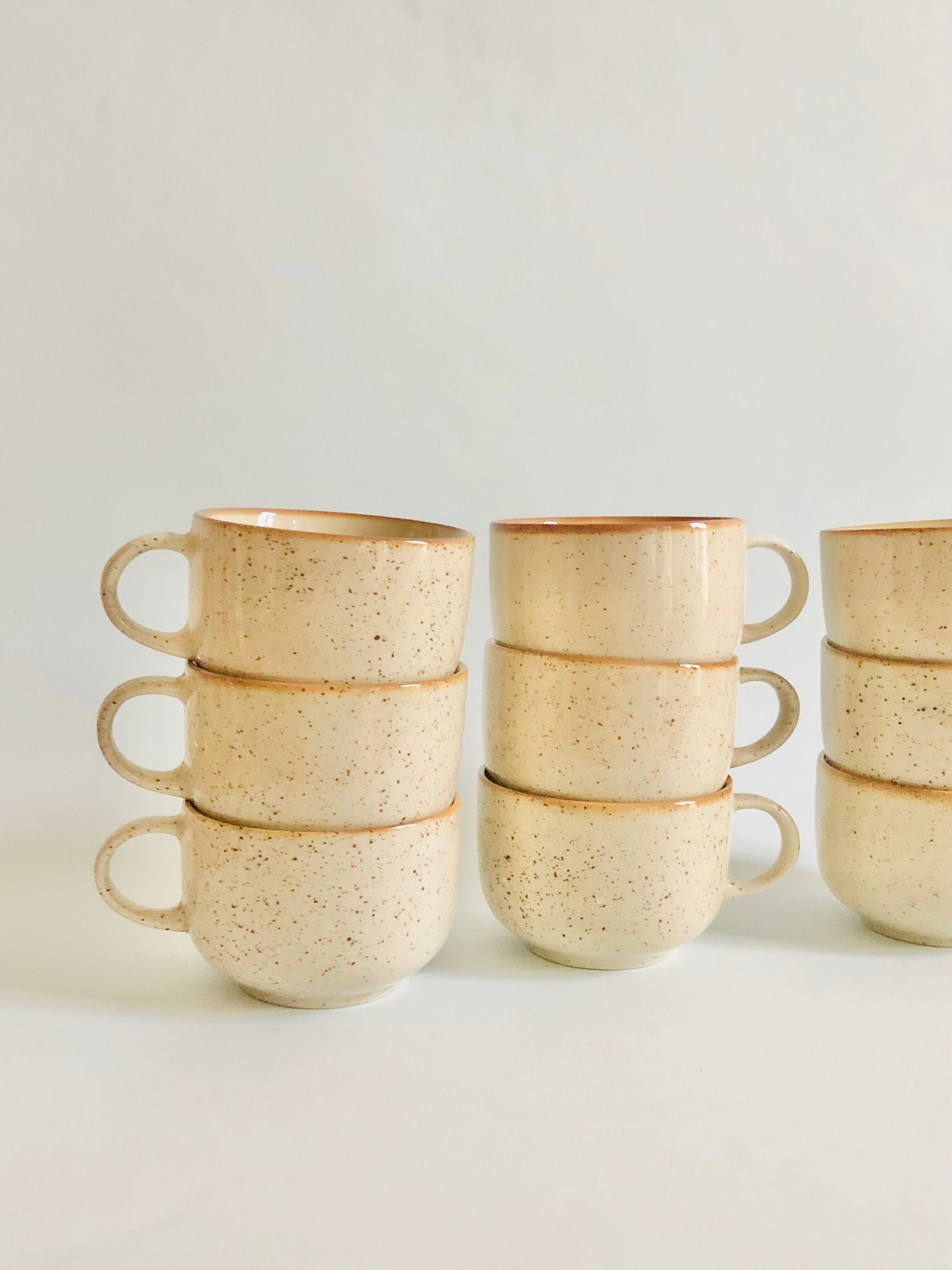 Set of 9 speckled ceramic coffee cups