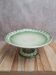 Antique compote stand Lunéville St Clément with green clover decoration.