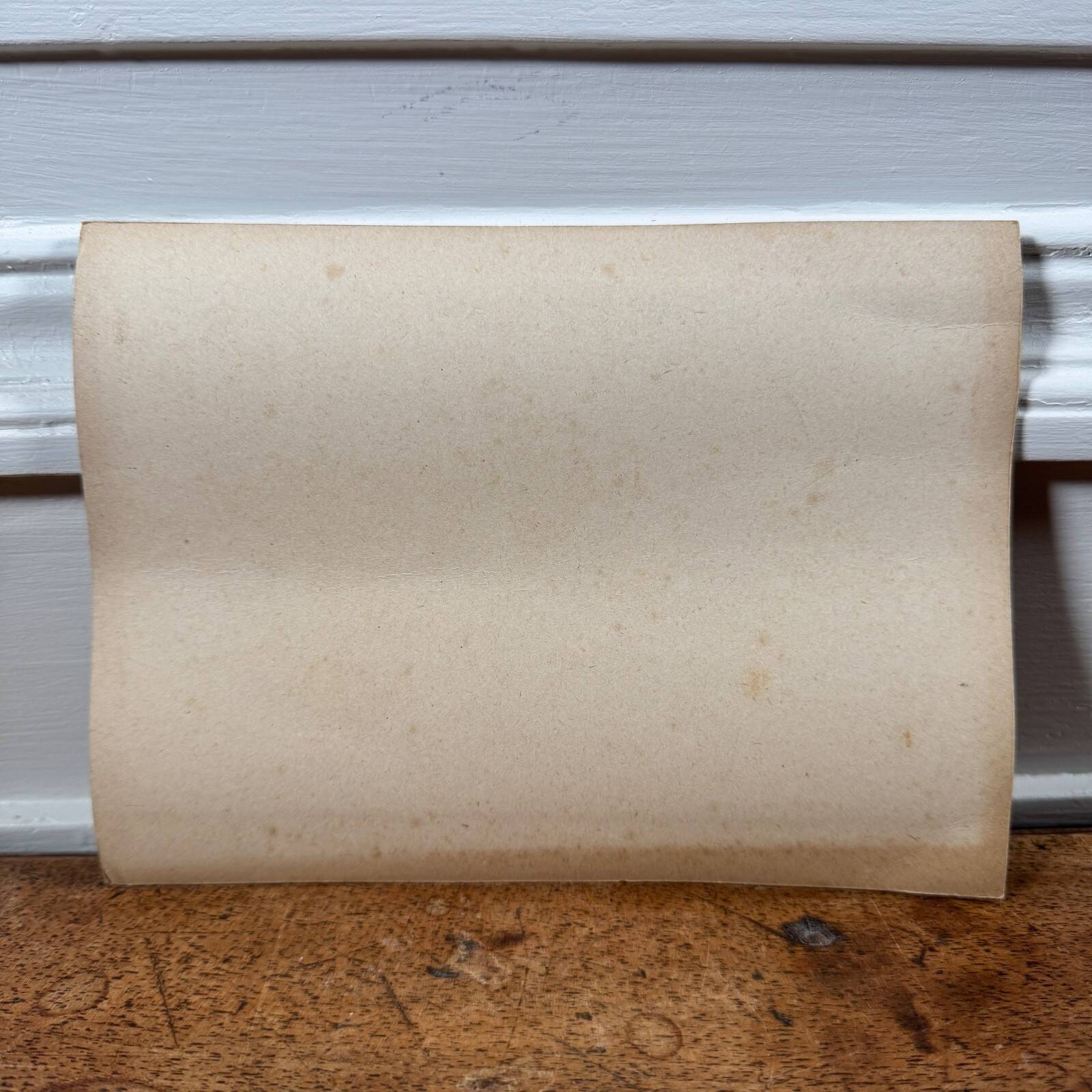 Photo album glued onto cardboard depicting a 19th-century watercourse.