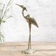 Golden brass heron