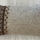 Pair of retro knitted wool cushions