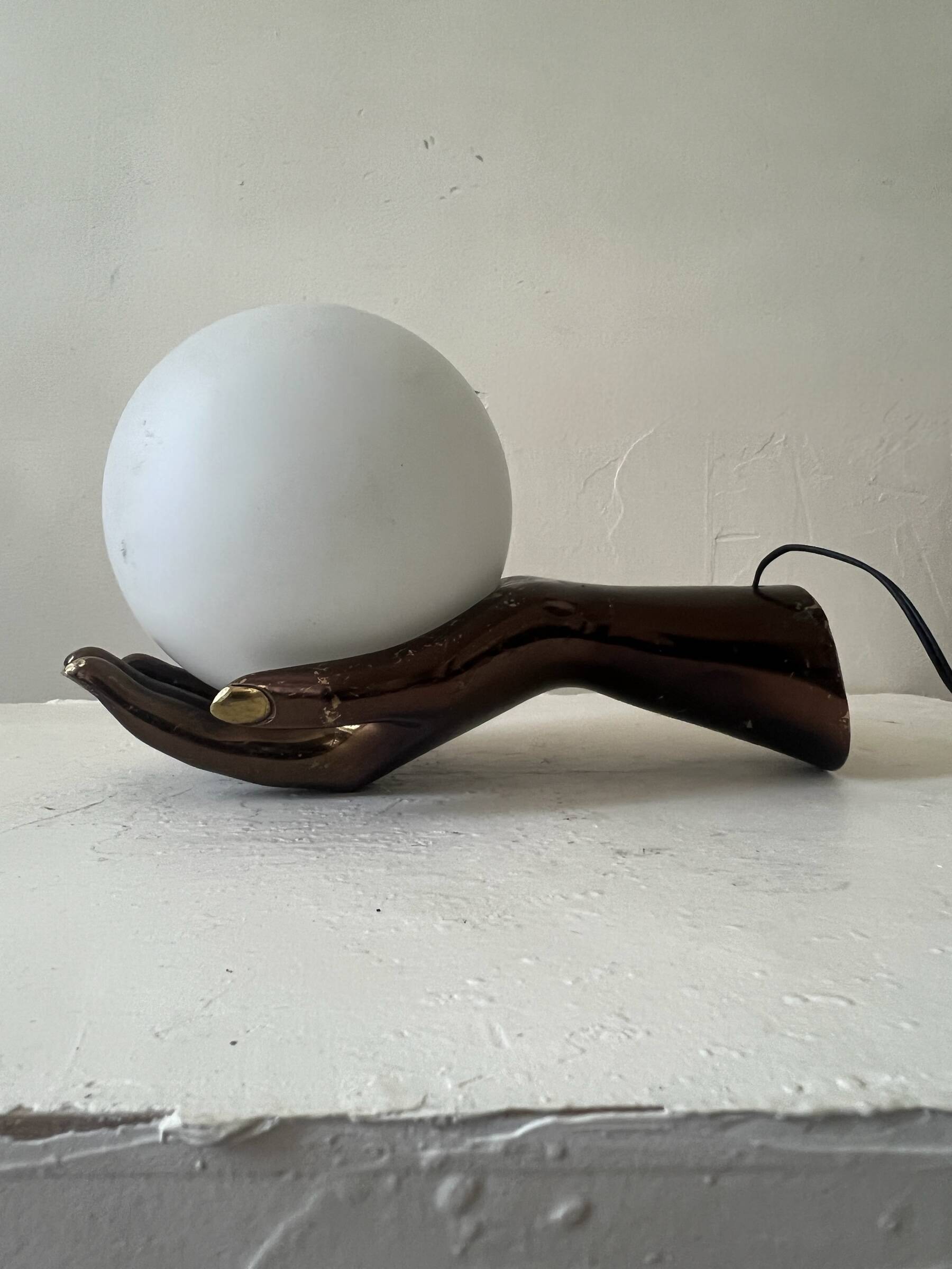 Vintage table lamp hand-crafted in bronze with an opaline globe, Maison Arlus 1970.