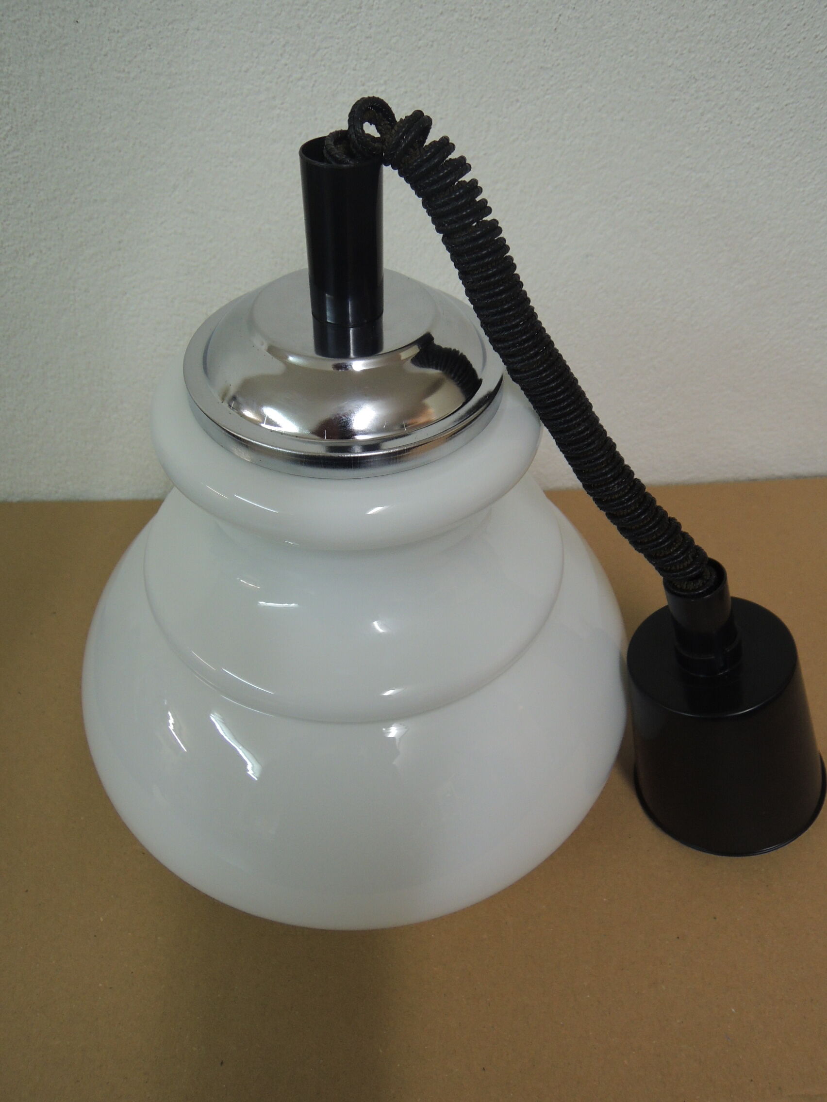 Vintage hanging rises and falls