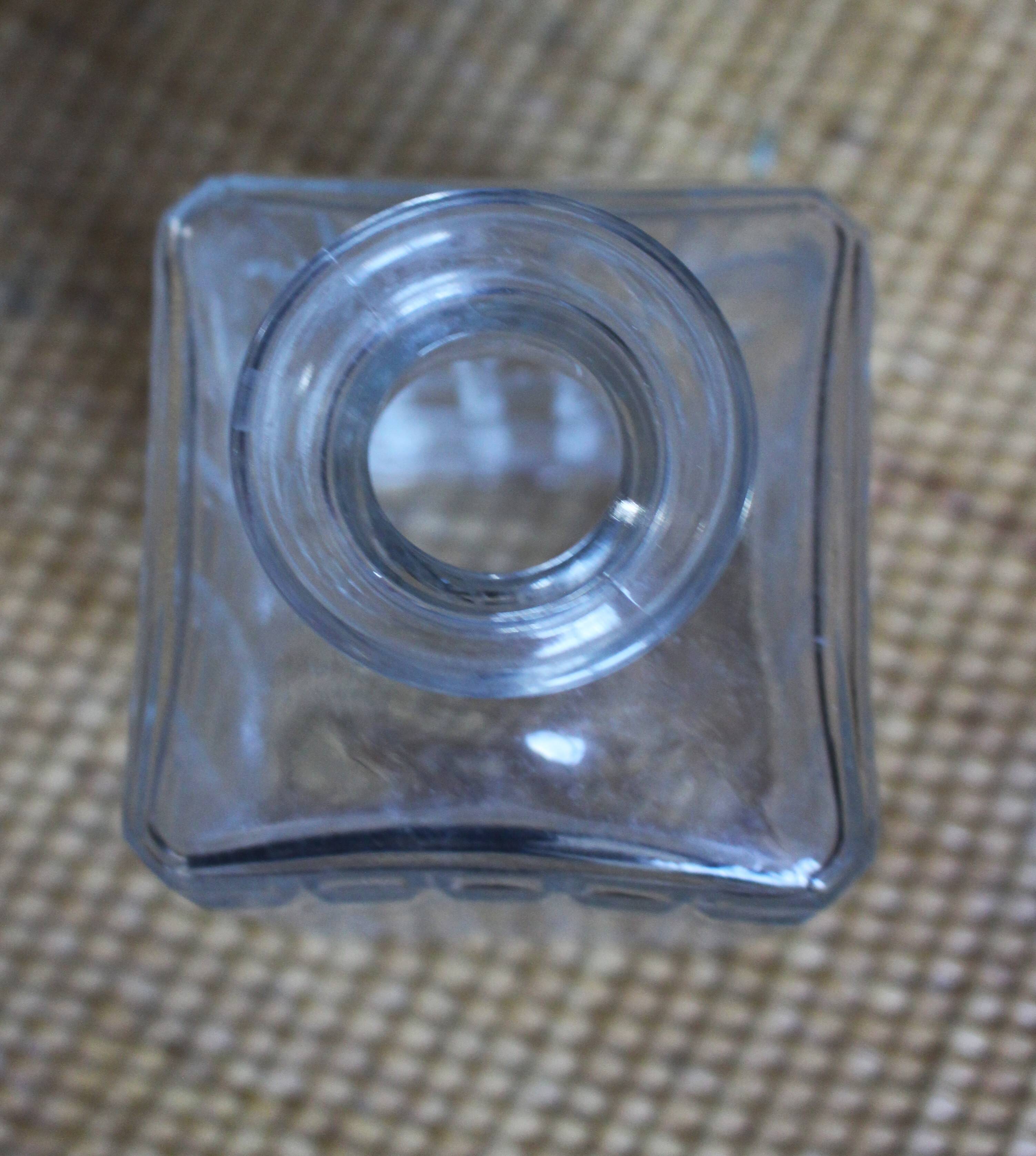 Vintage glass water carafe with rectangular vase.