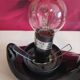 Black ceramic palm lamp and white opaline globe