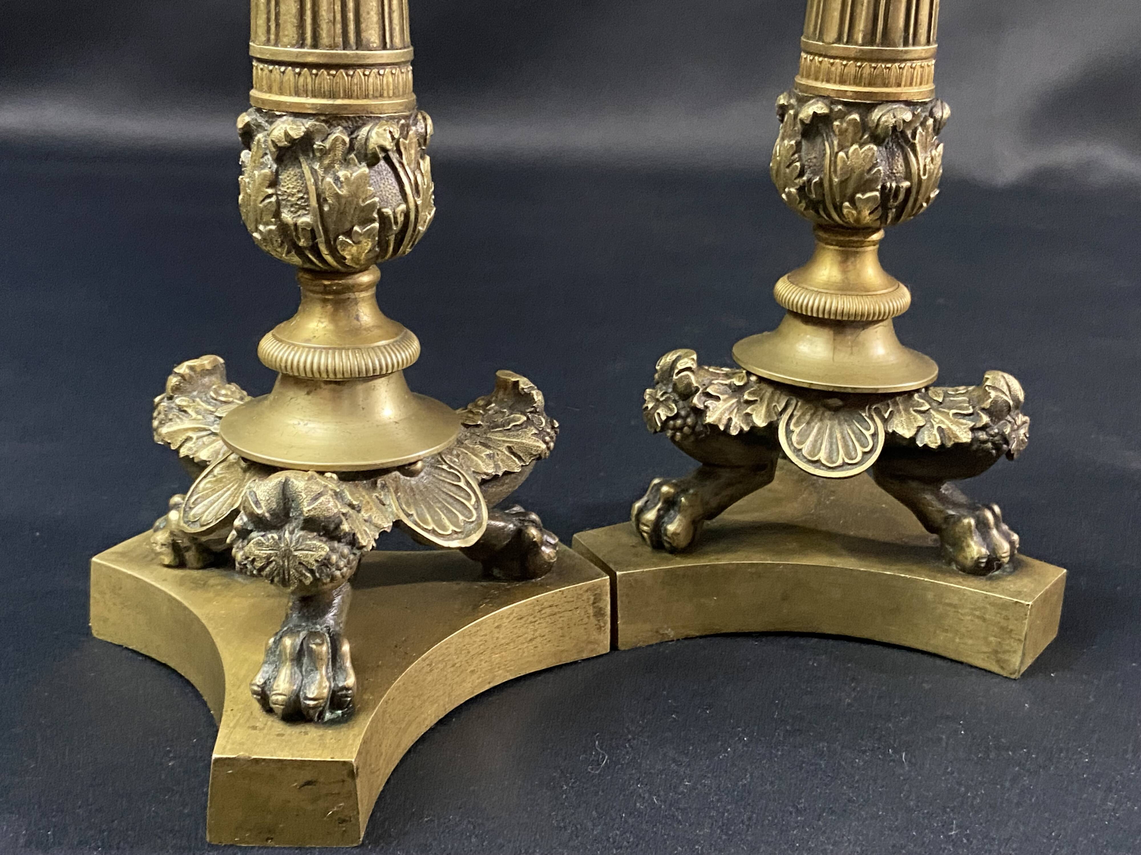 Pair of gilt and chiseled bronze candlesticks from the Restoration period