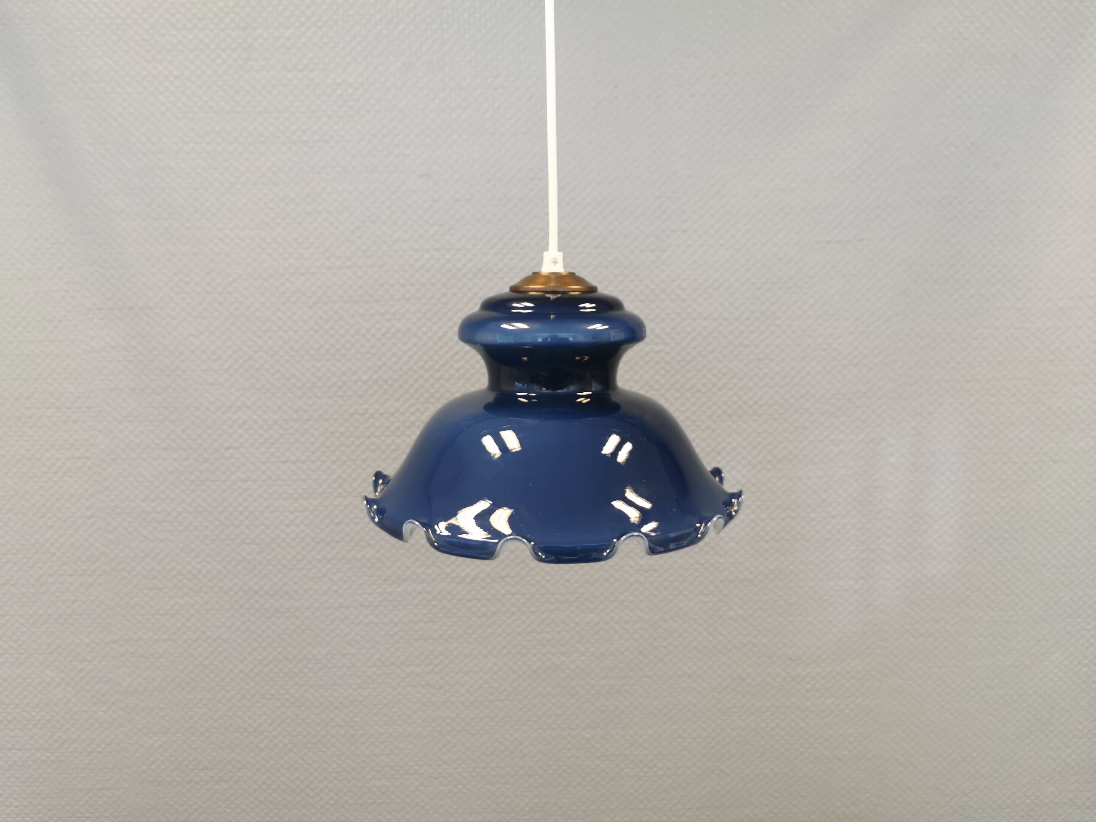 Hanging lamp in double layer opal glass, blue on the outside and white on the inside.
