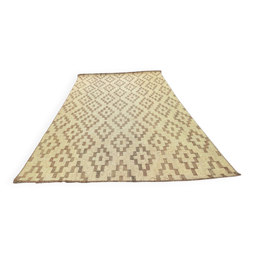 Vintage Touareg mat made of leather and reeds.