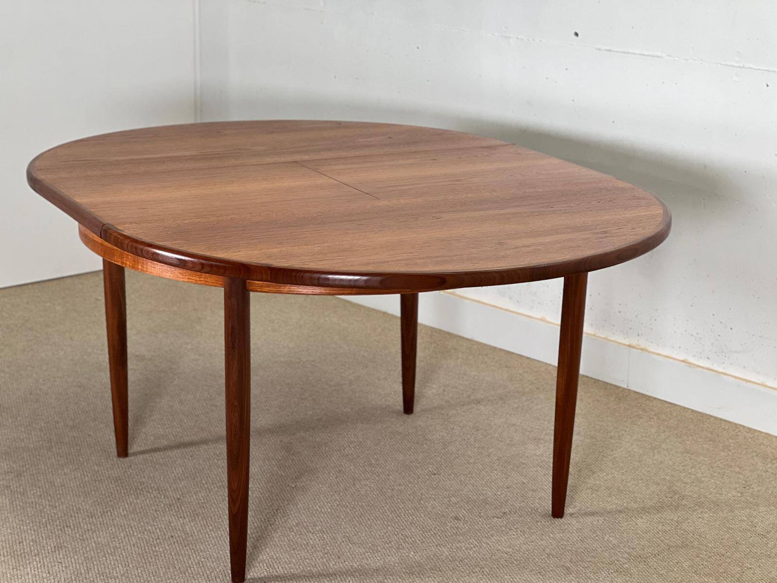 Round extending dining table by GPlan Fresco Collection 1960.