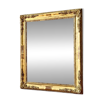 Golden antique mirror from the early 19th century.