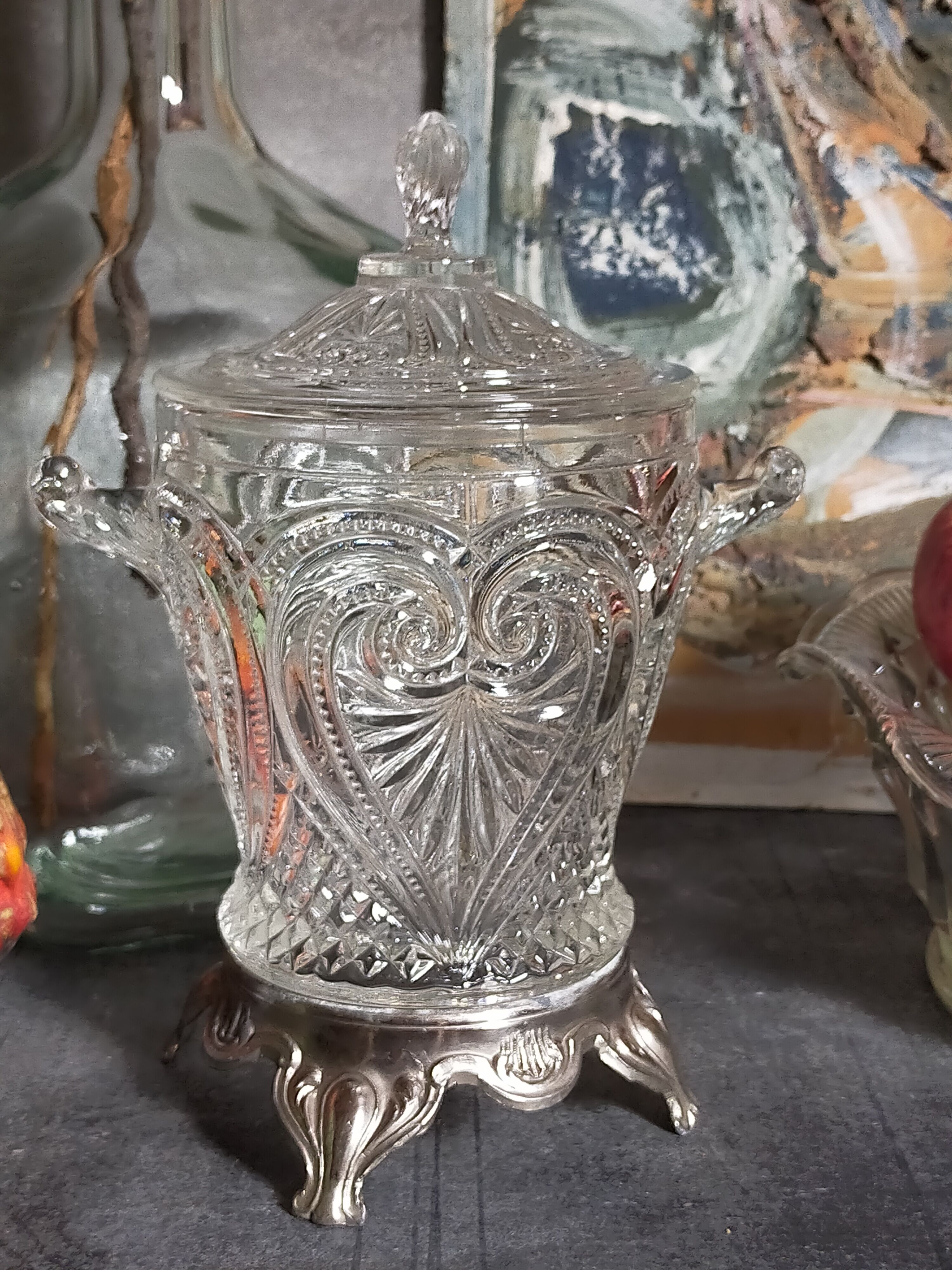 Antique glass compotier on metal stand