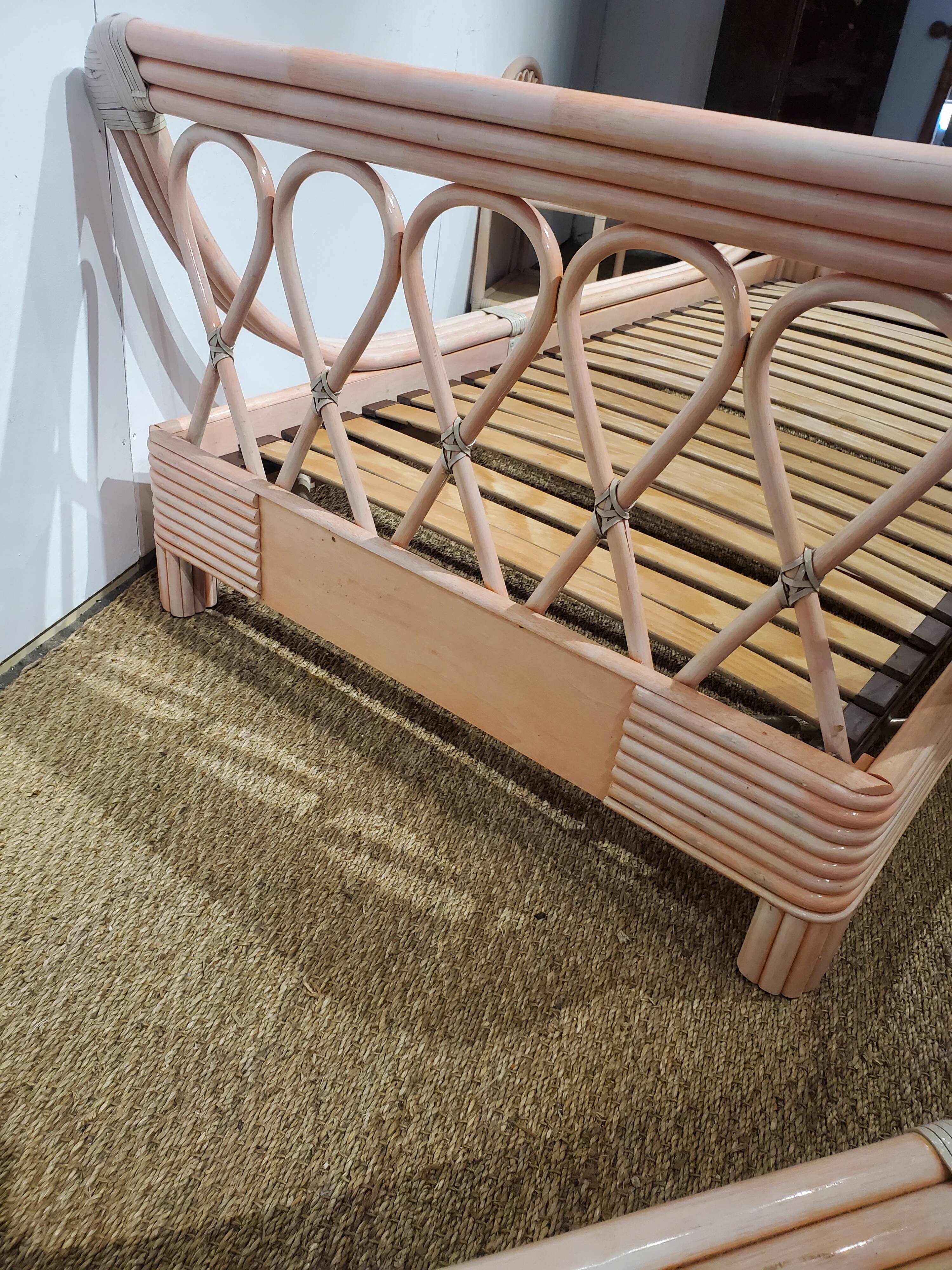 Pink rattan bed and bedside table set