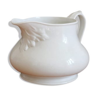 Antique white porcelain pitcher from the 19th century