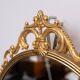 Brass Classic medallion shaped wall Mirror 1970s