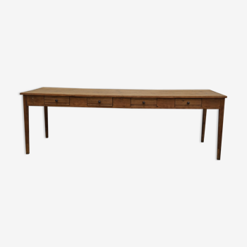 Old canteen in pine table