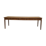 Old canteen in pine table
