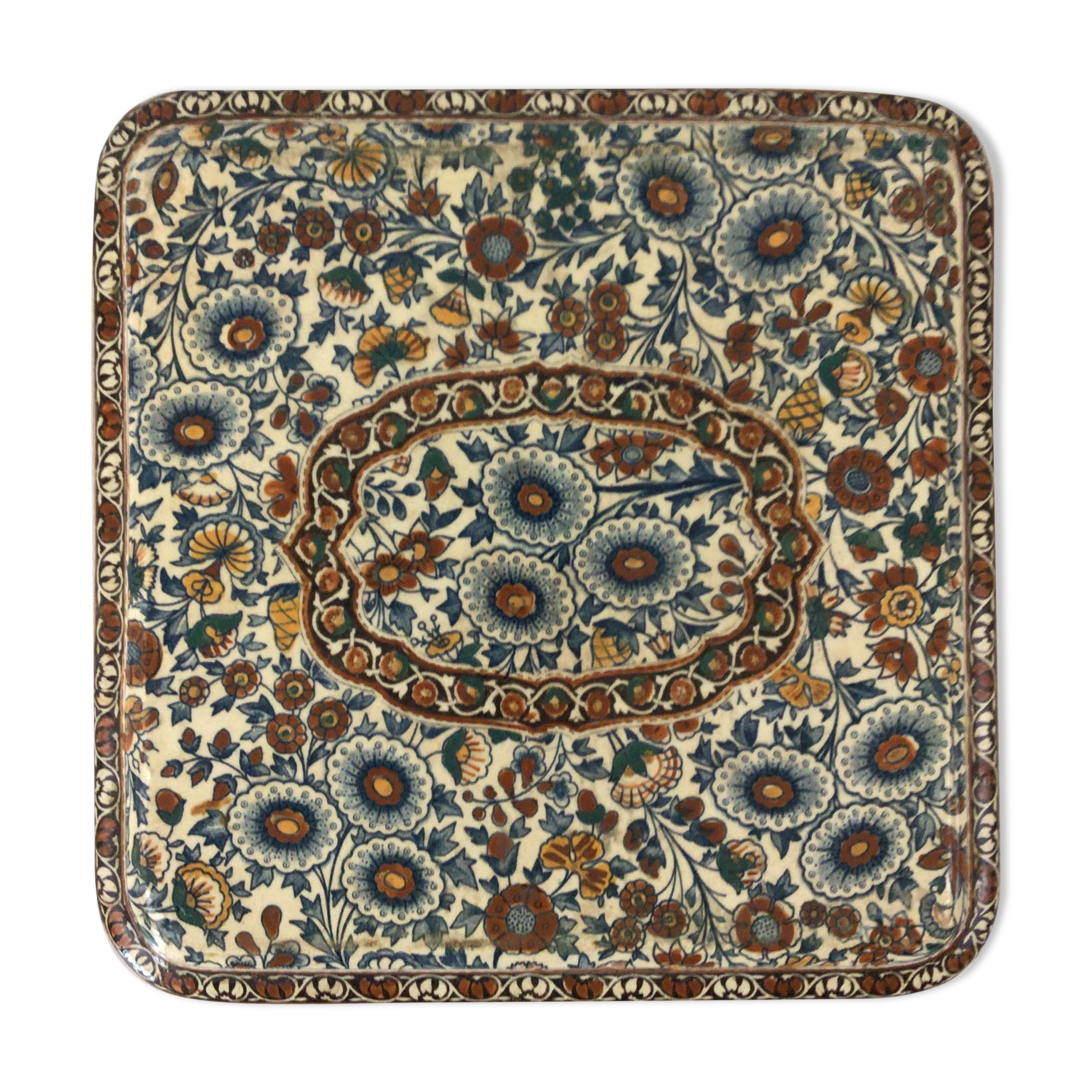 Dessous plat en Gien 1876