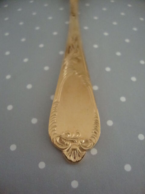 Golden metal cake forks