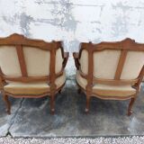Pair of armchairs basket louis XV in carved walnut