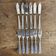 Fish cutlery in stainless steel with shell decoration