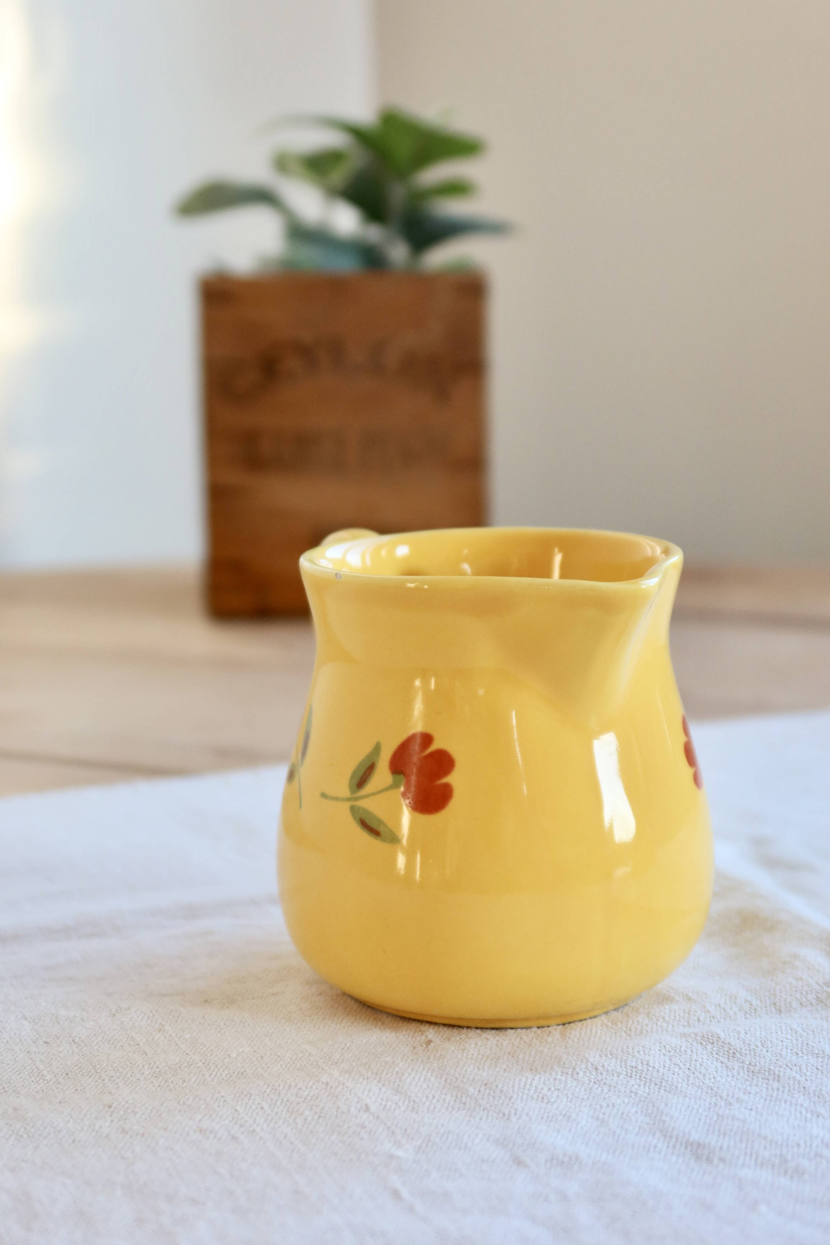 Vintage yellow ceramic milk jug – Hand-painted floral pattern