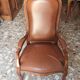 Leather armchair signed