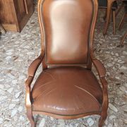 Leather armchair signed