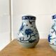Enamelled ceramic salt and pepper
