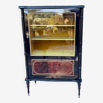 Mahogany display case with gilded brass decoration