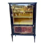 Mahogany display case with gilded brass decoration