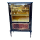 Mahogany display case with gilded brass decoration