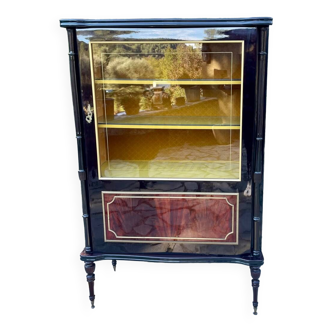 Mahogany display case with gilded brass decoration