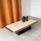 Coffee table in brass and travertine.