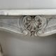 Louis XV style fireplace in veined white Carrara marble, 19th century.