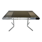 Smoked glass dining table with chrome legs, 1970s design by Roche Bobois.