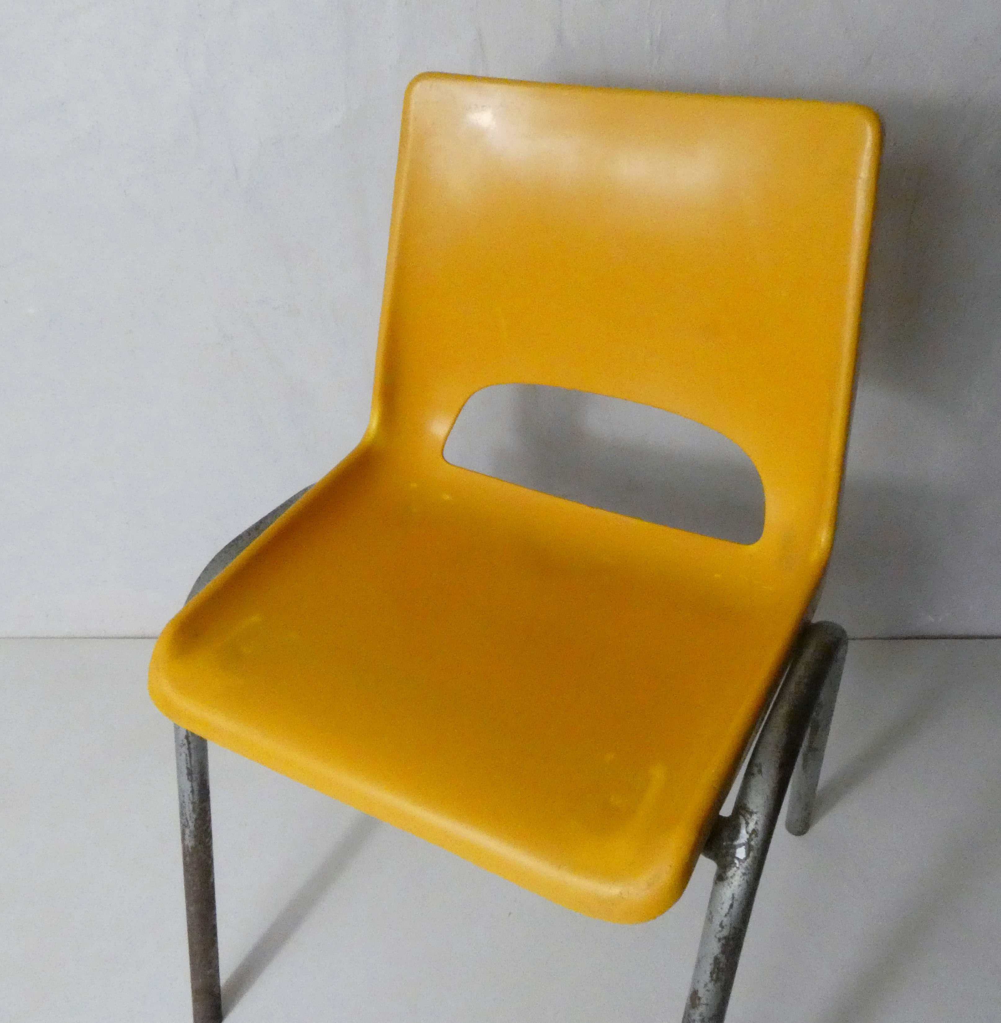 yellow plastic child chair