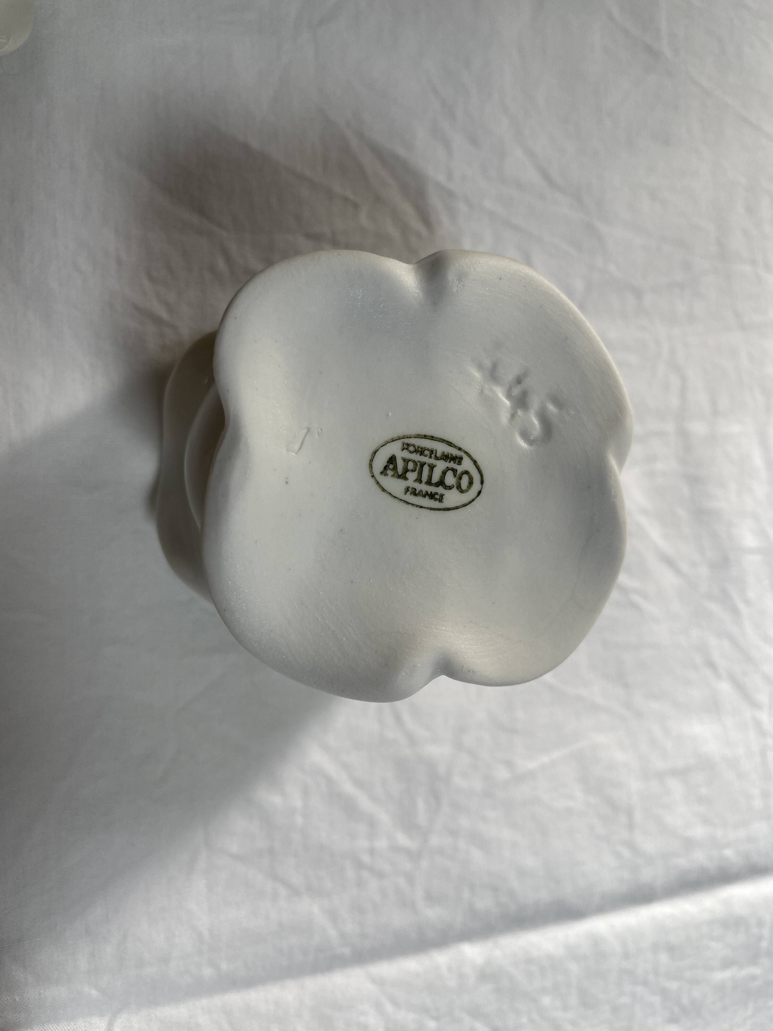 White porcelain rose shaped candle holders