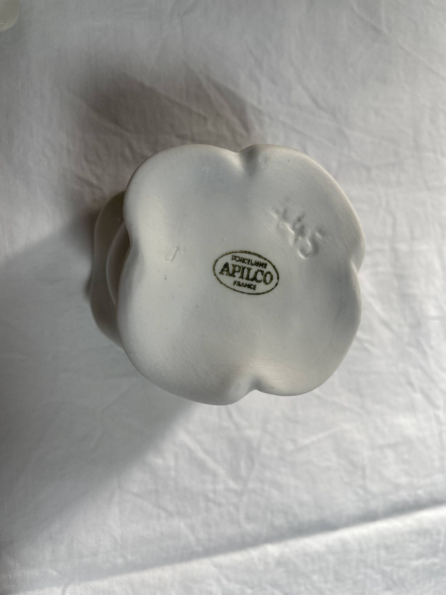 White porcelain rose shaped candle holders