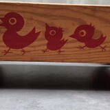 Walking trolley with multicolored wooden cubes