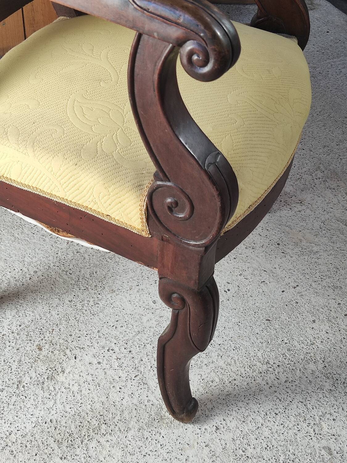 2 antique matching armchairs in wood and fabric