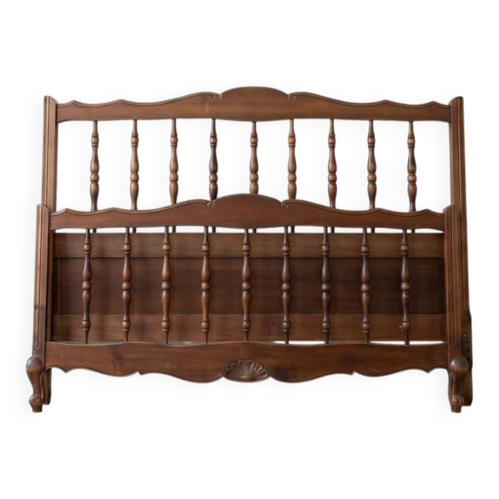 Double bed frame in antique Louis XV style made of solid wood.