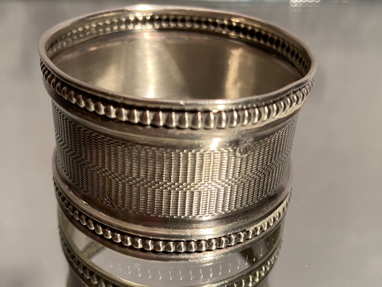 Solid silver napkin ring Minerva with Louis XVI style guilloché decoration