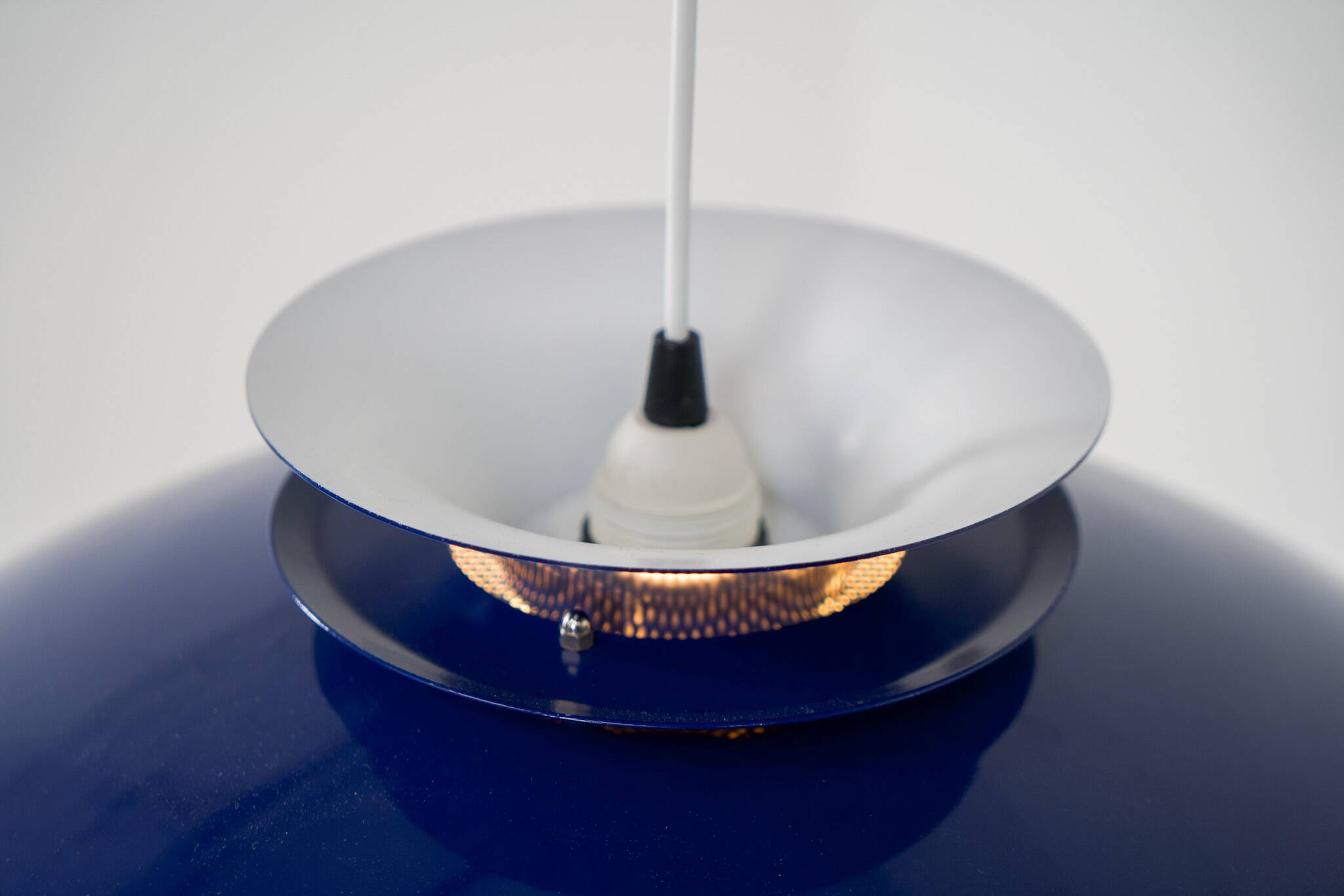 Elegant blue pendant light by Belux