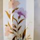 White ceramic vase with floral patterns