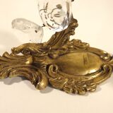 Pair of wall clams in gilded bronze stamps