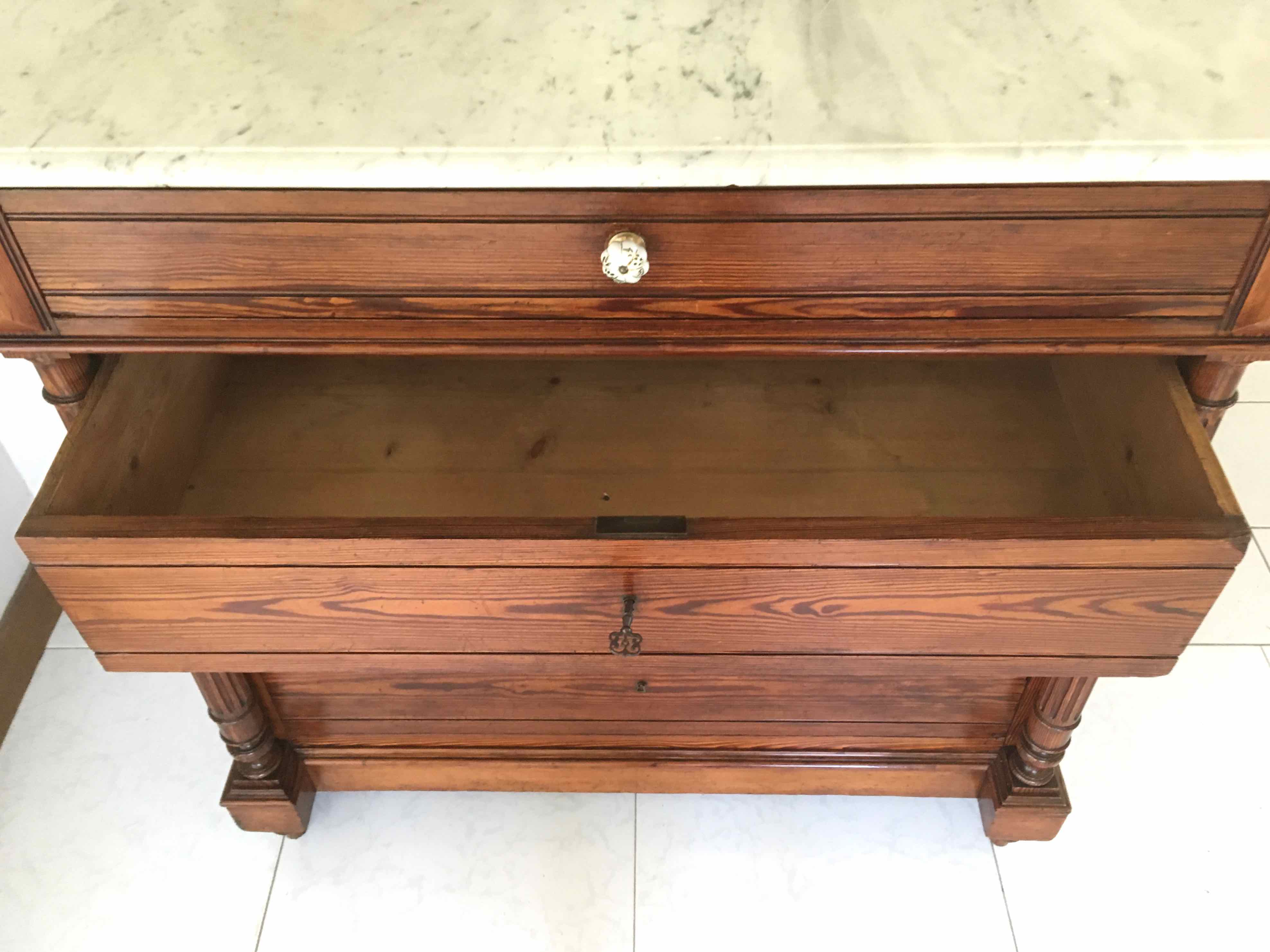 Marble and pitchpin chest of drawers