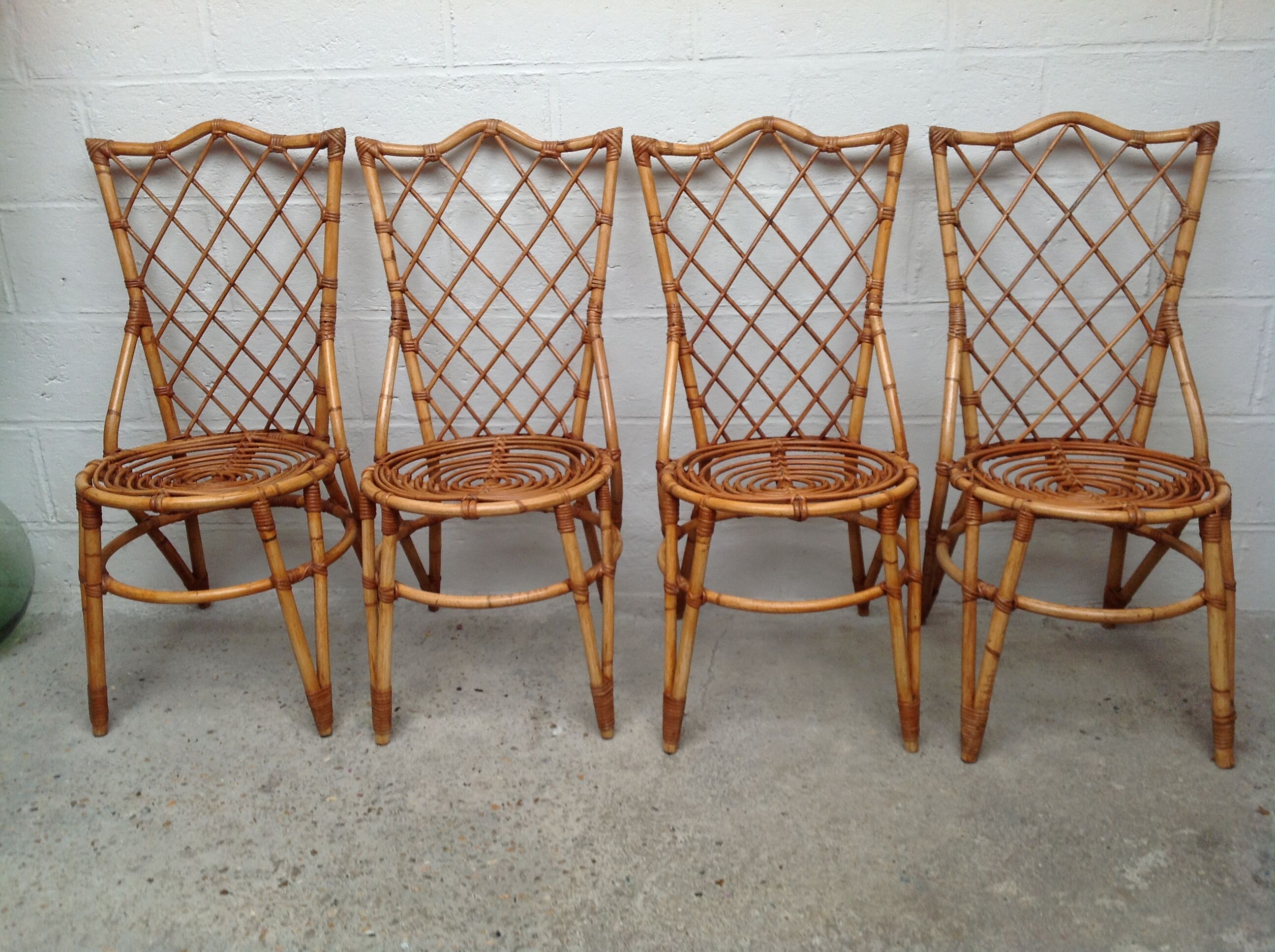 Rattan chairs by Louis Sognot