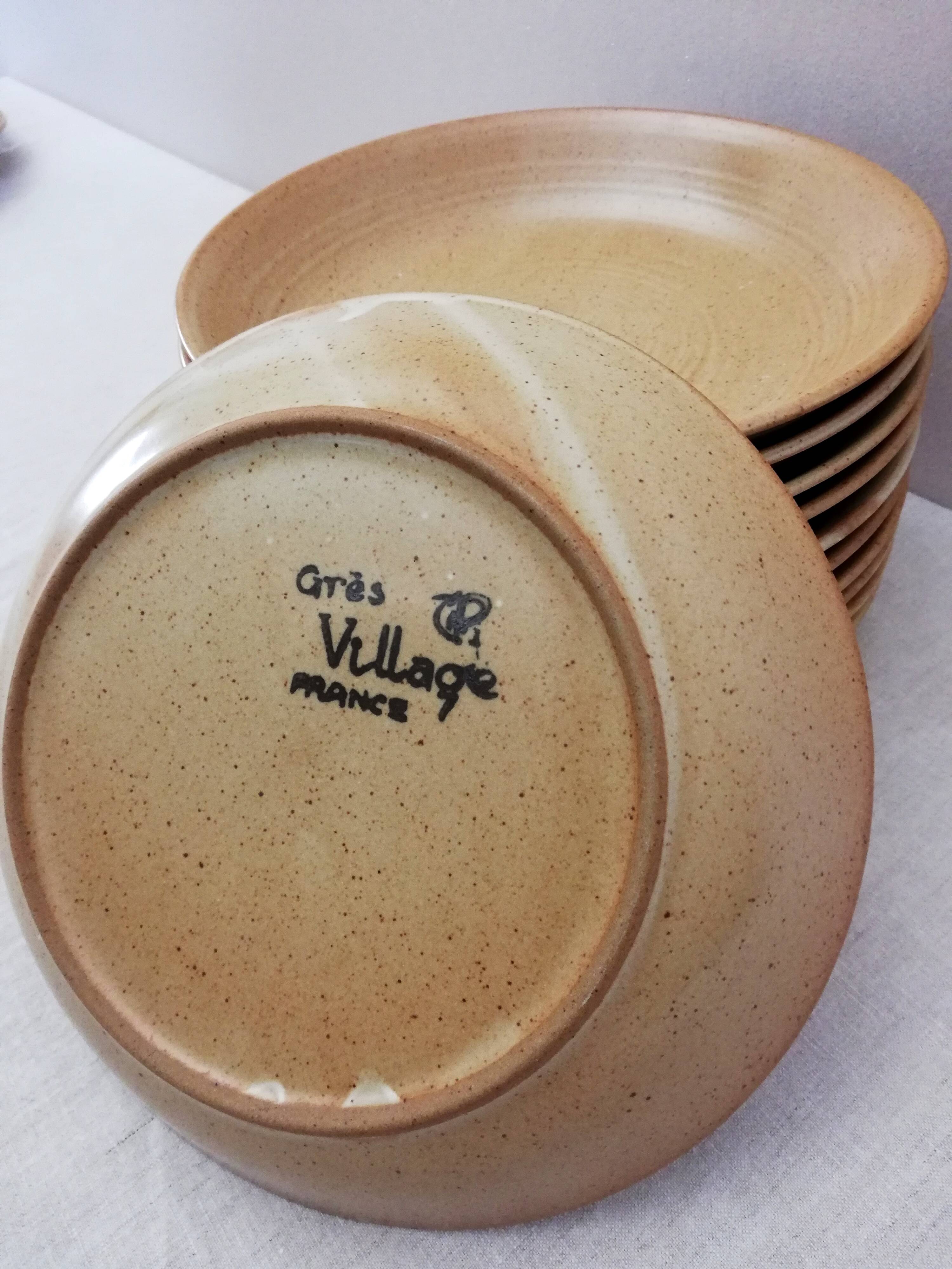 Series of 11 hollow plates Grès Village CNP