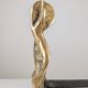 Pair of sculptural brutalist bronze fireplace andirons, 1970s