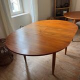 Scandinavian round teak table with butterfly extensions from the 60s
